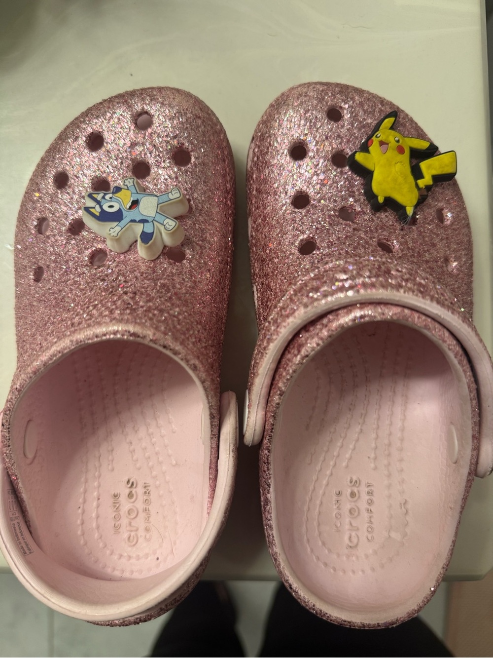 CROCS Kids Glitter Pink Clogs with Pikachu & Bluey Charms